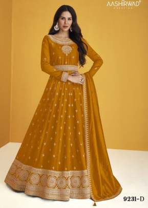 Aashirwad Creation Gulkand Heerva Heavy Faux Georgette Anarkali Suits Mustard Yellow Color DN 9231